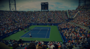 Tennis match in a crowded court